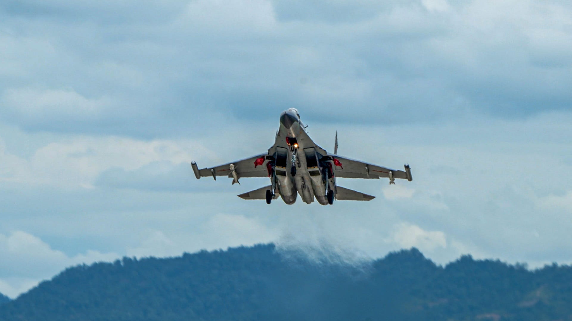 Image for the title: China warns of Taiwan 'war' as military drills encircle island 