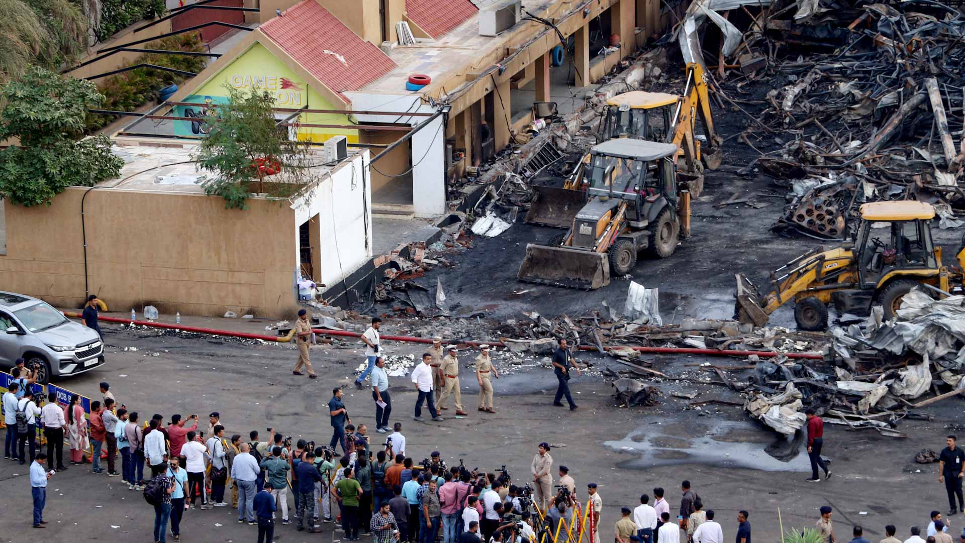 Image for the title: Four children among 27 dead in India amusement park fire 