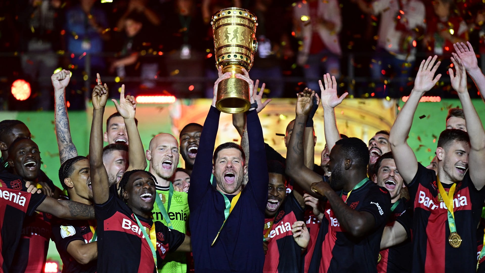 Image for the title: 10-man Leverkusen lift German Cup to claim a first double 