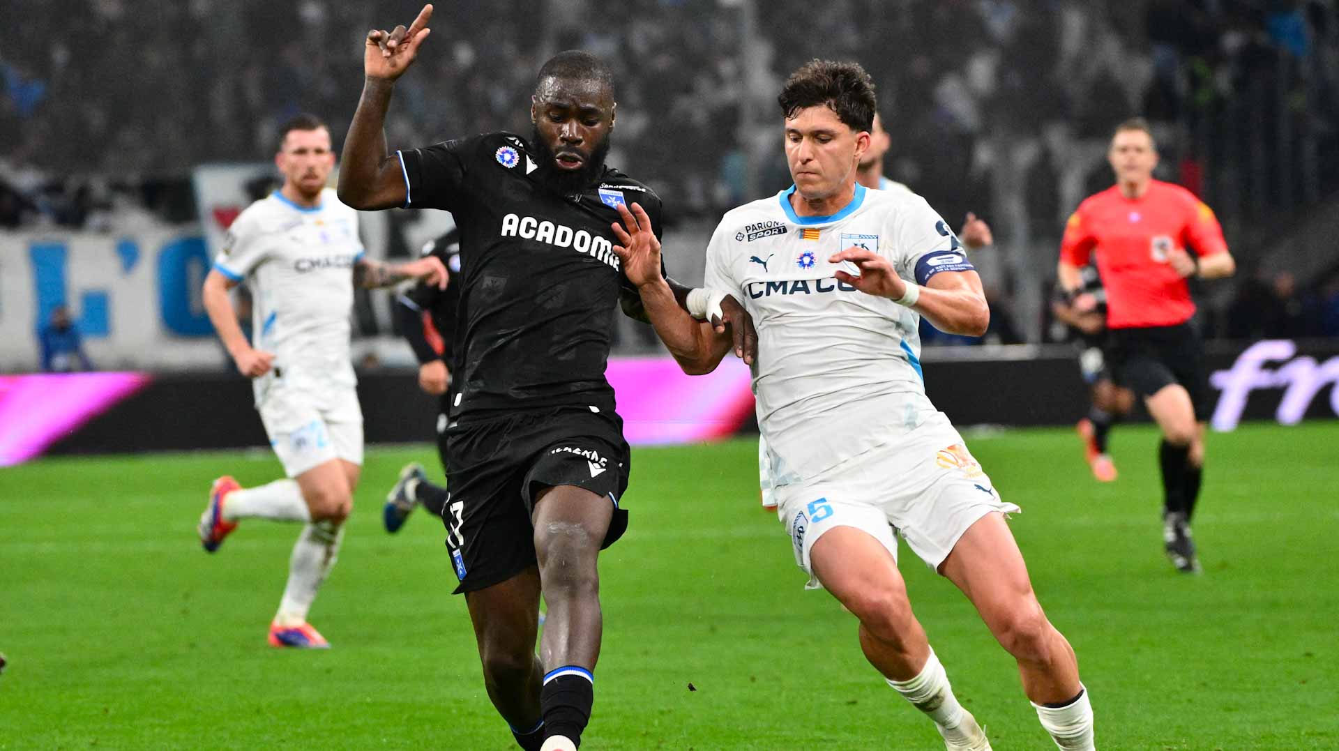 Image for the title: Auxerre dominates Marseille with 3-1 victory in Ligue 1 