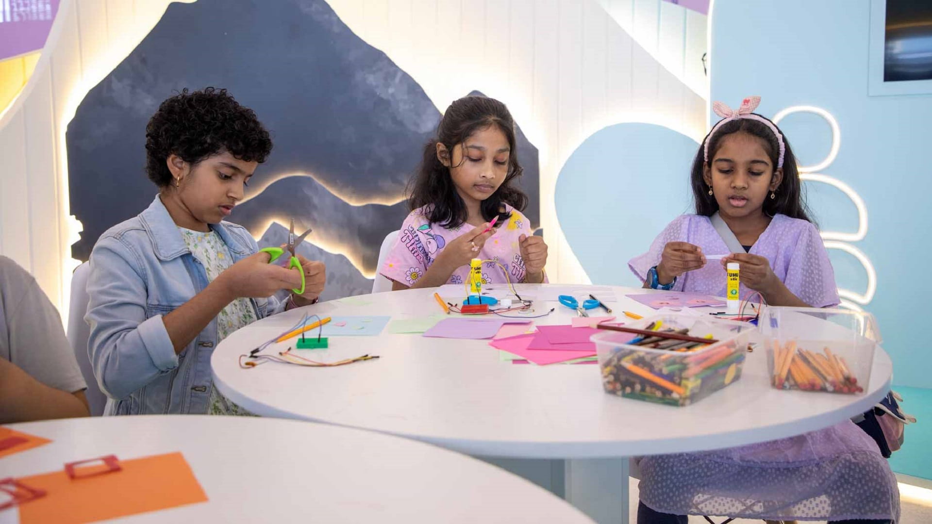 Image for the title: Young inventors light up SIBF with glowing robot creations 