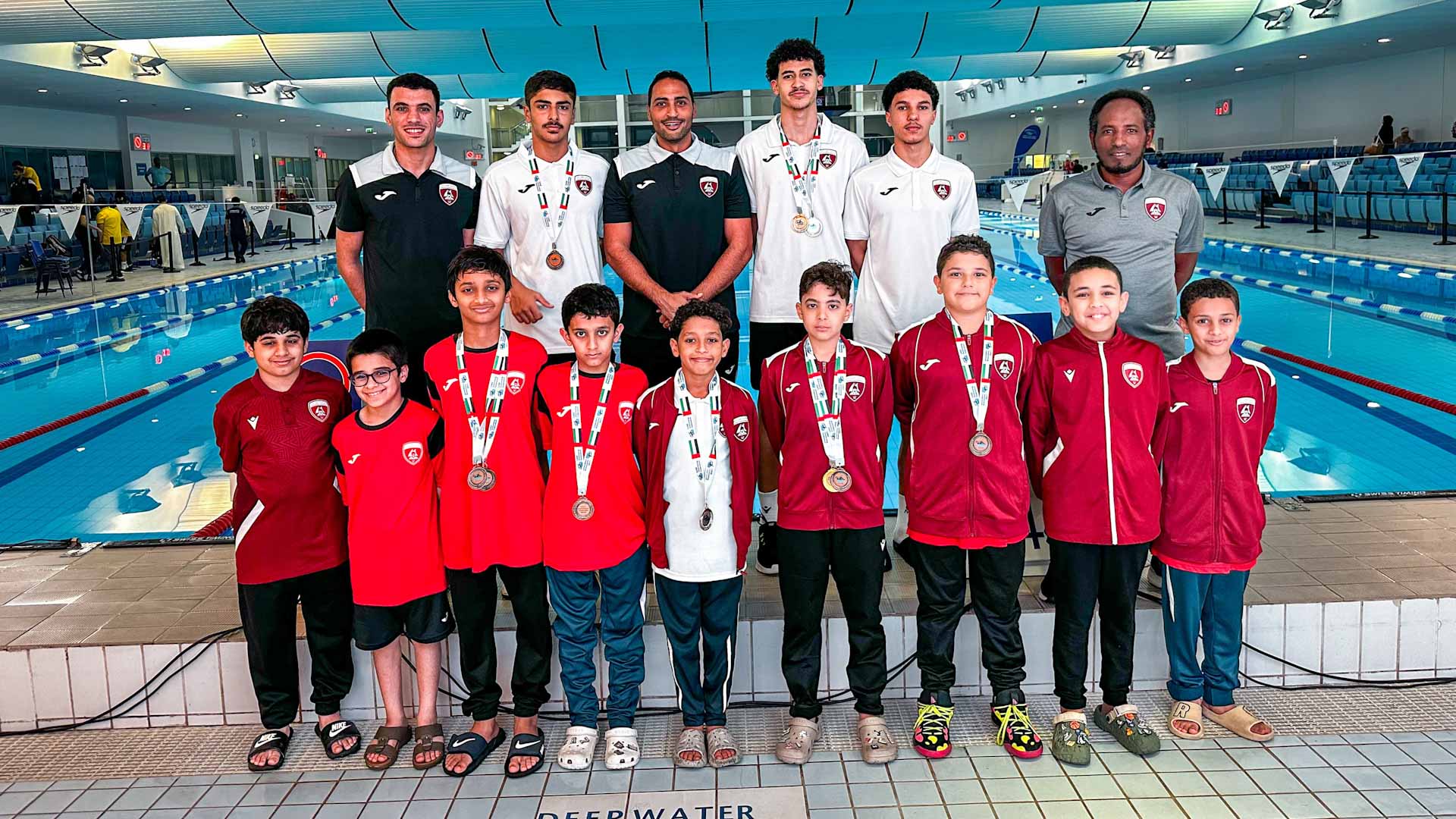Image for the title: 13 colorful medals for Al Hamriyah swimmers at the UAE Cup 