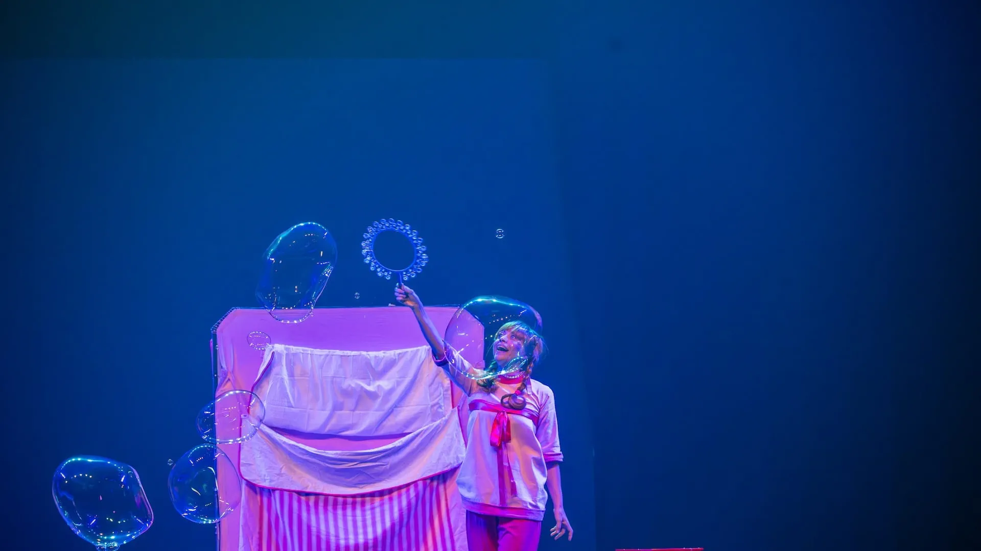 Image for the title: Bubble sister act transports spectators to dreamworld at SIBF