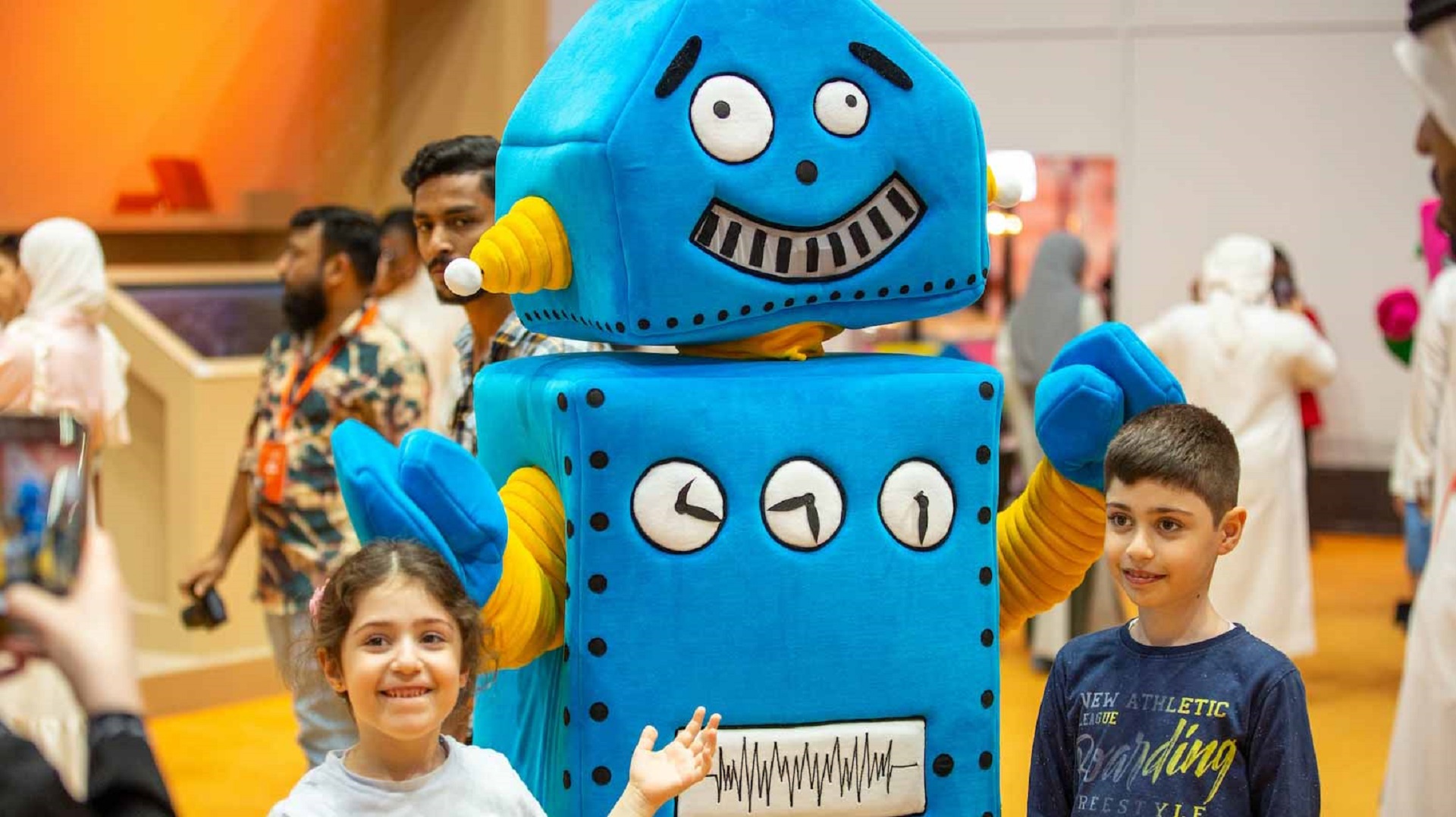 Image for the title: Robots with big personalities spread joy at SIBF 