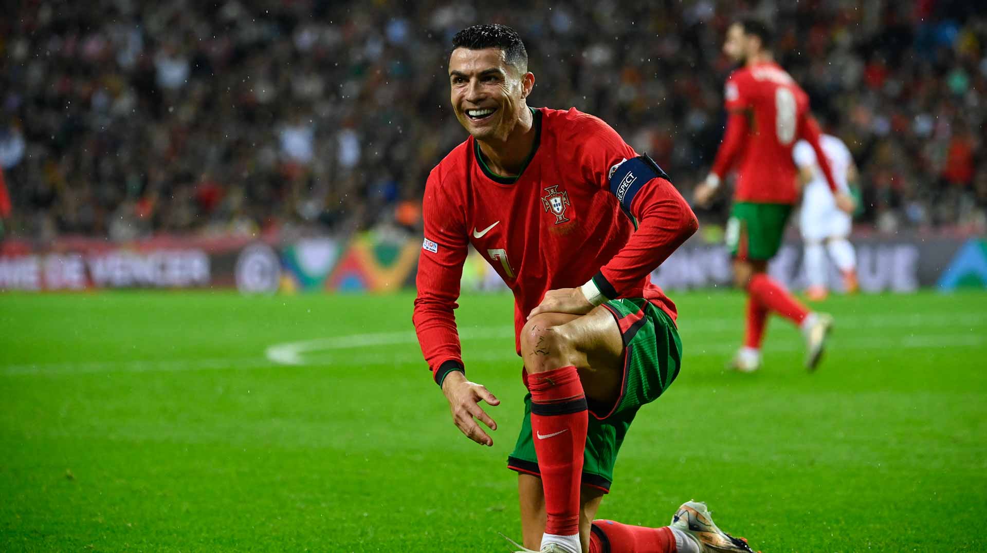 Image for the title: Ronaldo shines as Portugal rout Poland 