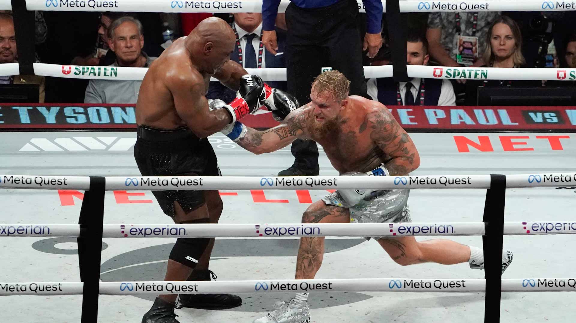 Image for the title: Tyson beaten by Youtuber Paul in heavyweight return 