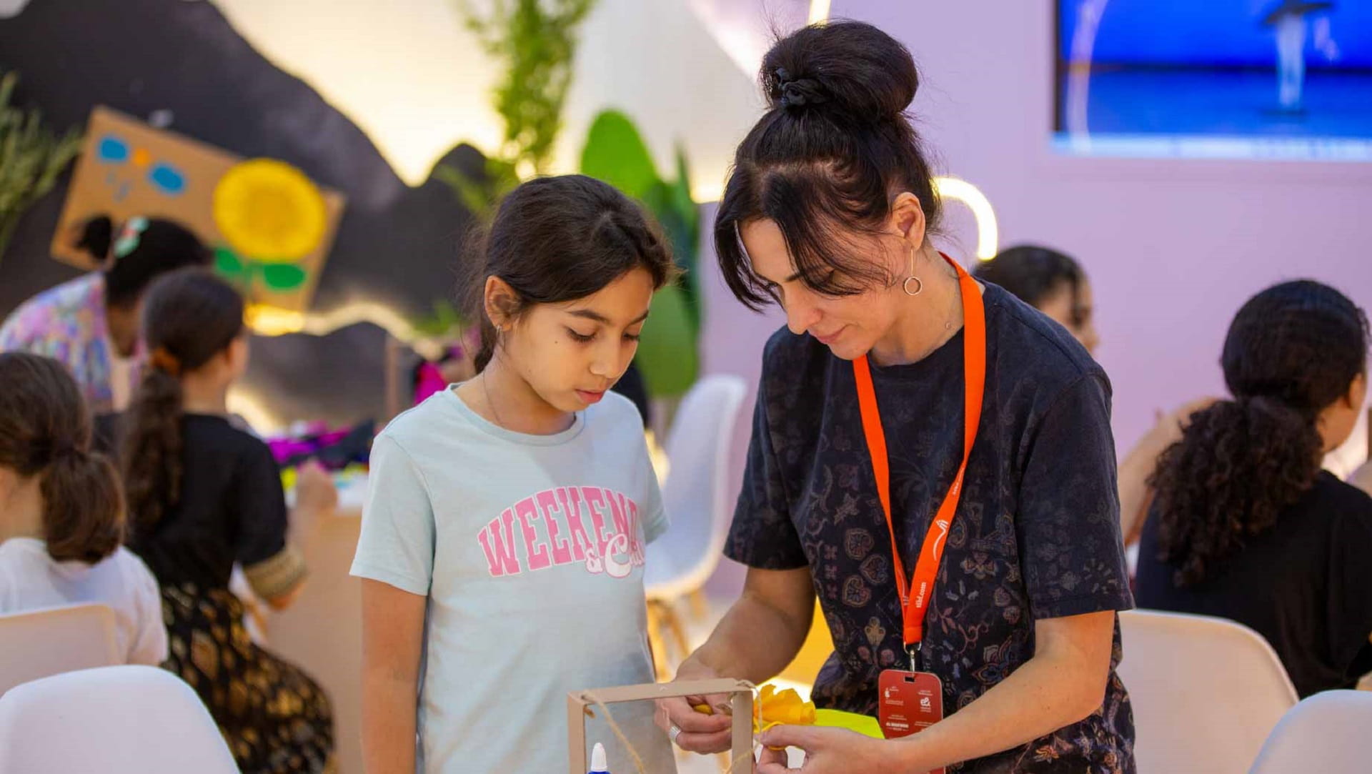 Image for the title: Framed paper dresses workshop inspires designers at SIBF  