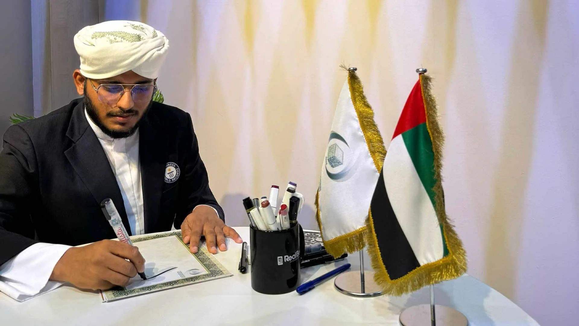 Image for the title: ICESCO hosts world-renowned calligrapher Mohammed Jassim at SIBF 