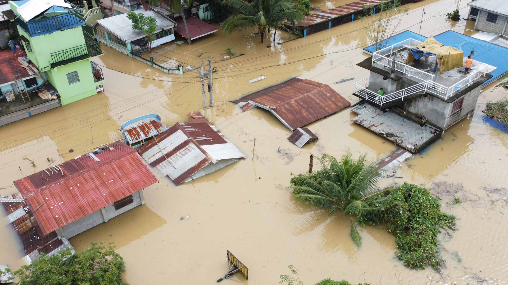 Image for the title: Philippines recovers from its sixth significant storm in few weeks 