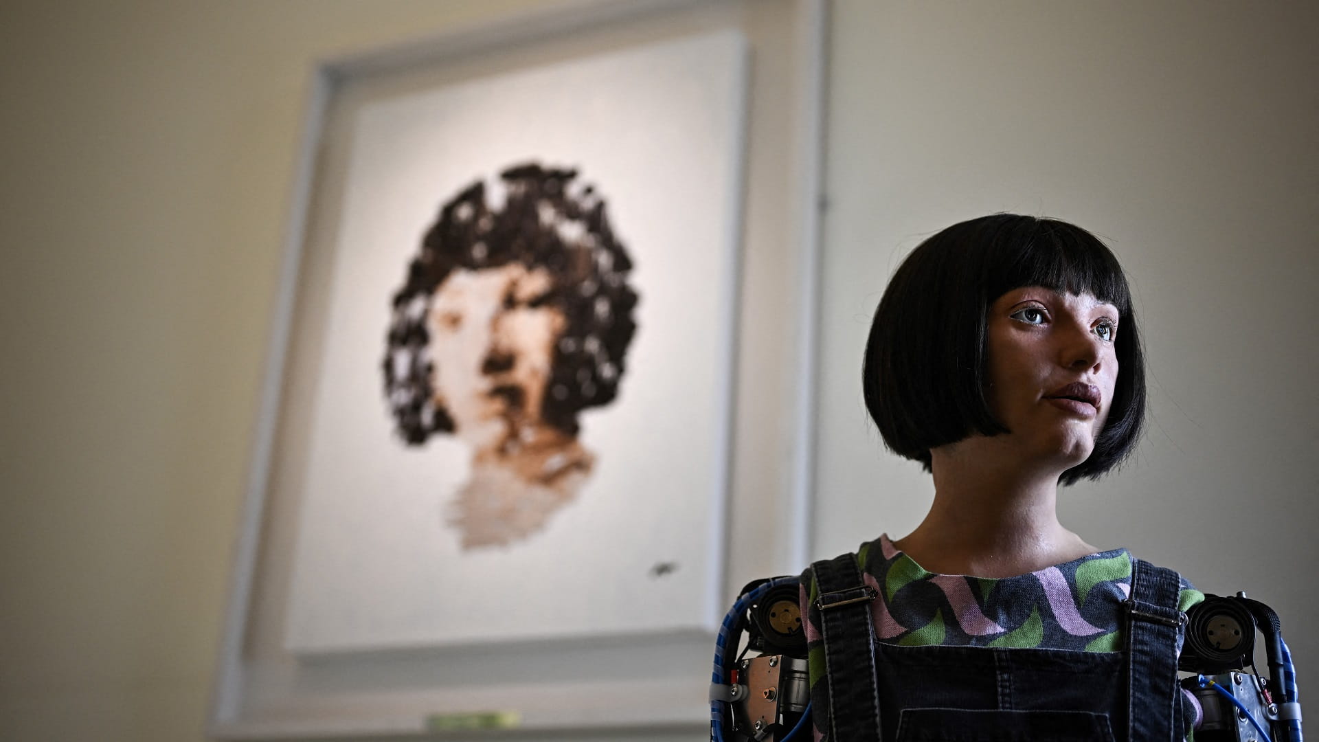 Portrait by humanoid robot to sell at auction in art world first 