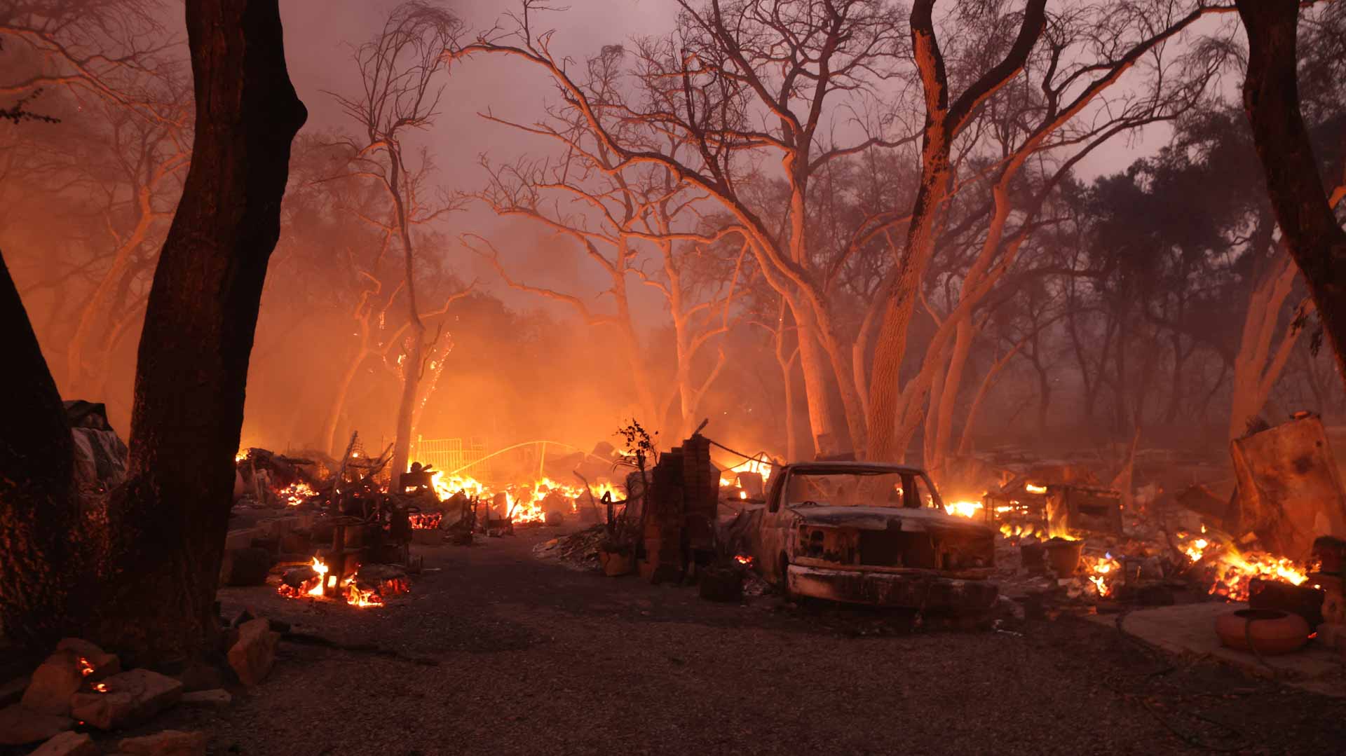 Image for the title: California wildfires burn dozens of homes 
