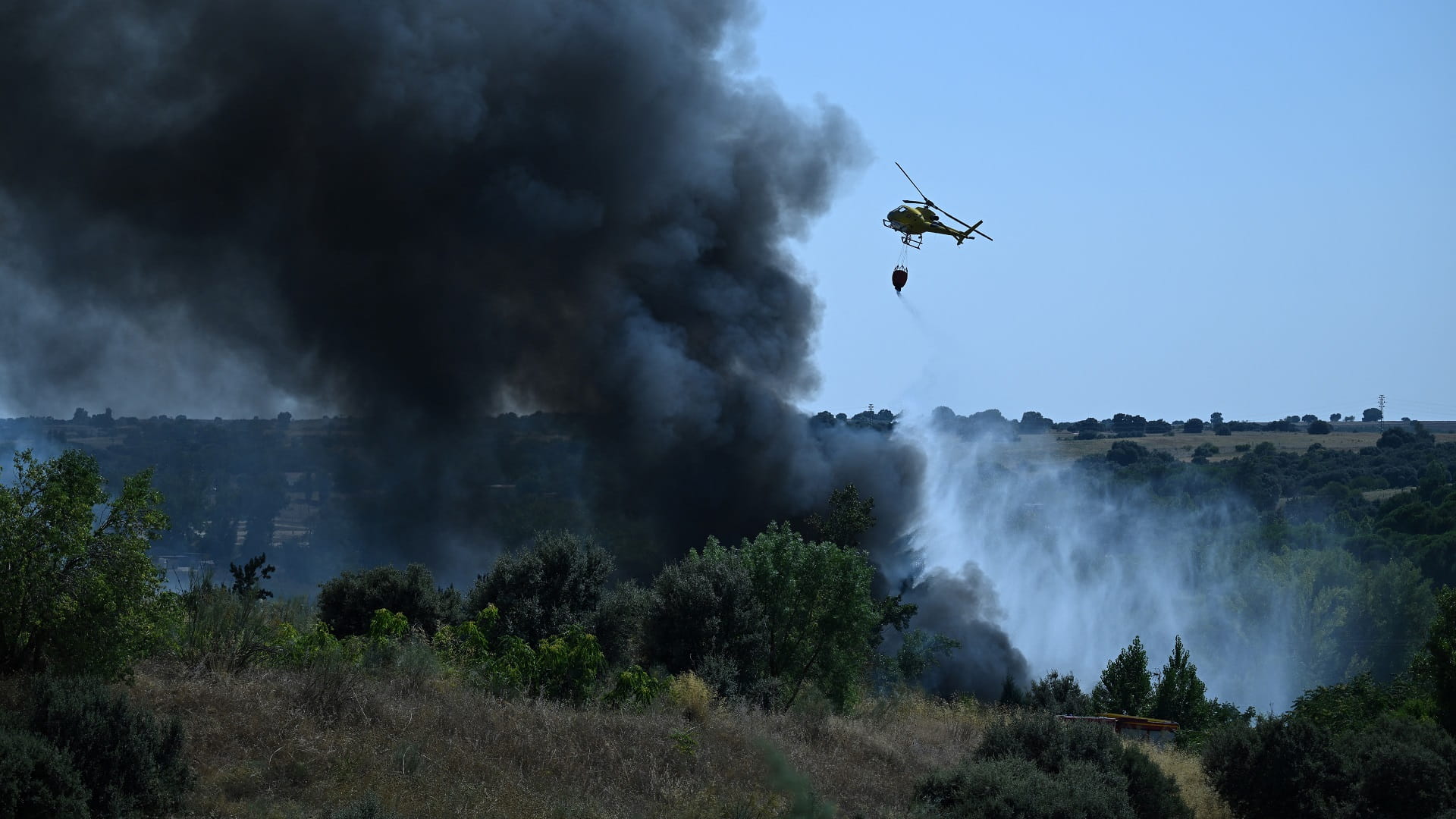 Wildfire in Spain's Catalonia closes main motorway, trainline
