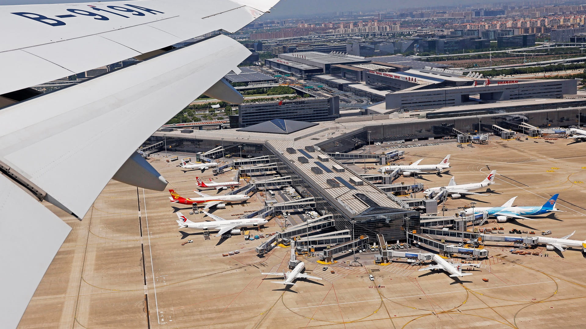 Flights grounded in Shanghai as China prepares for typhoon 