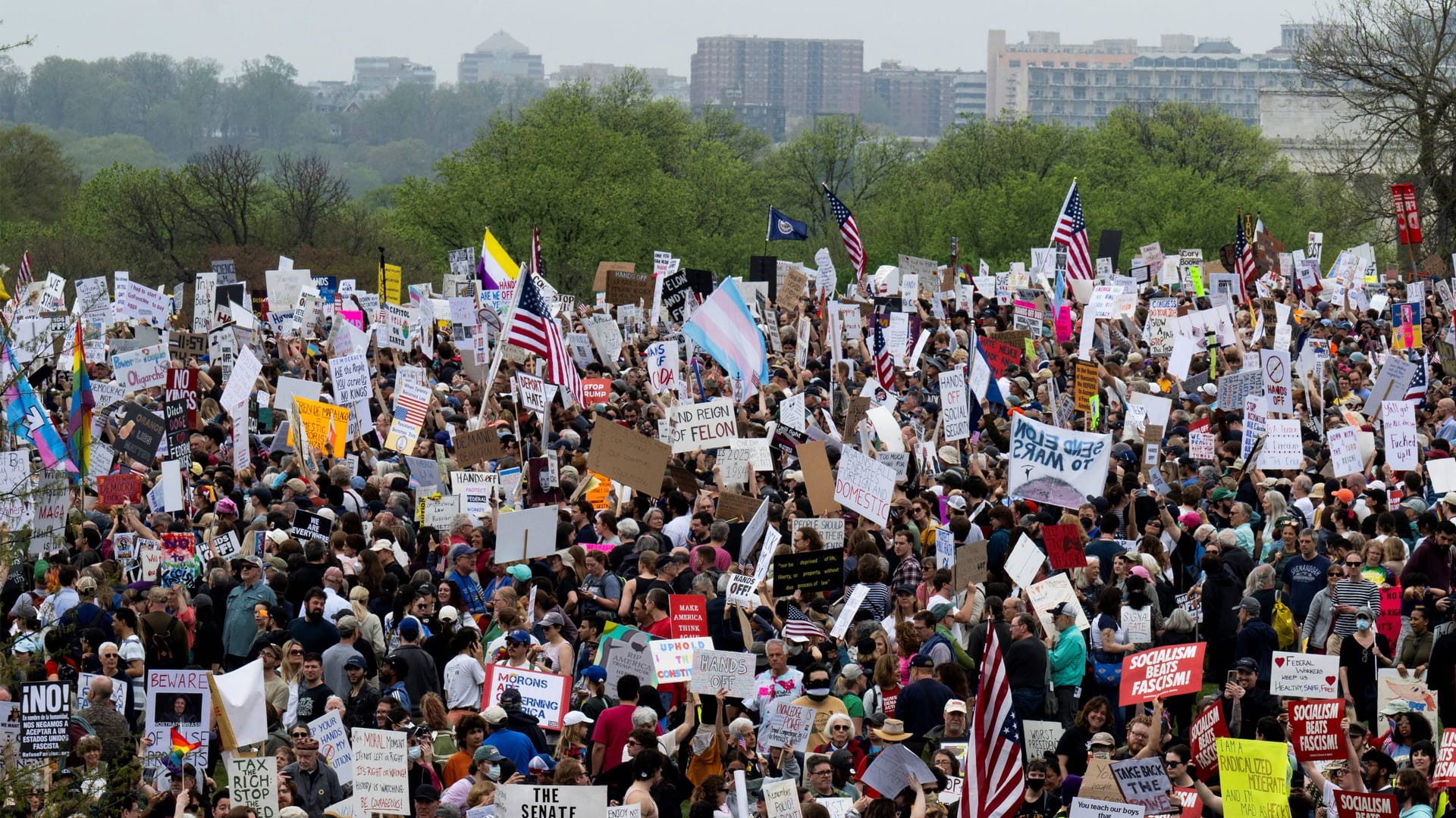 Tens of thousands march in US against Trump 'devastation' 