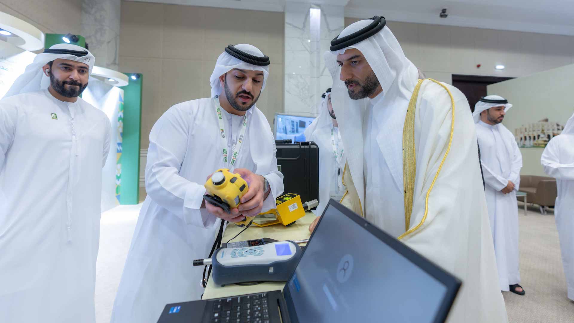 Listening to the explanation from members participating at the event