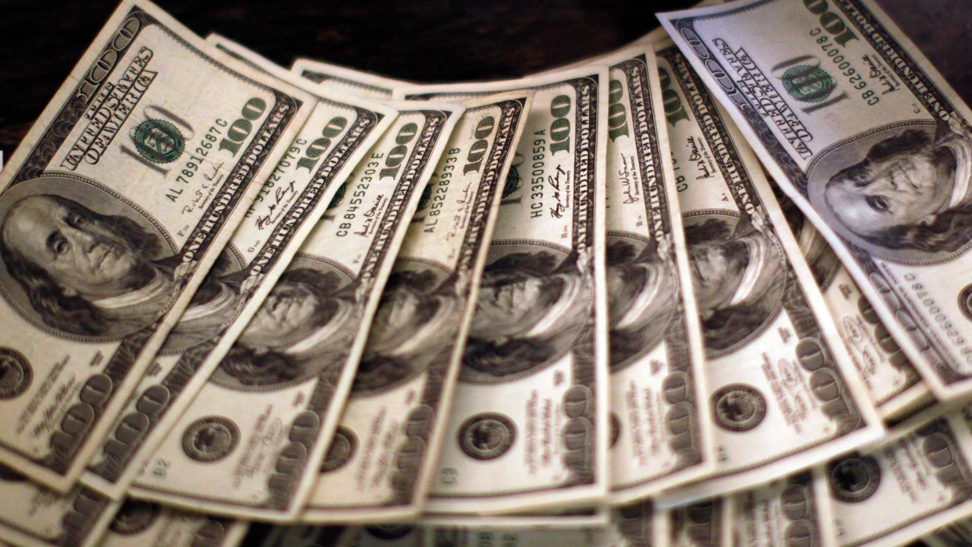 Dollar slips on Fed credibility concerns, euro tops $1.1700 