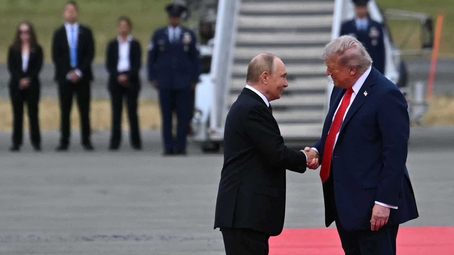 Trump, Putin shake hands ahead of high-stakes summit 