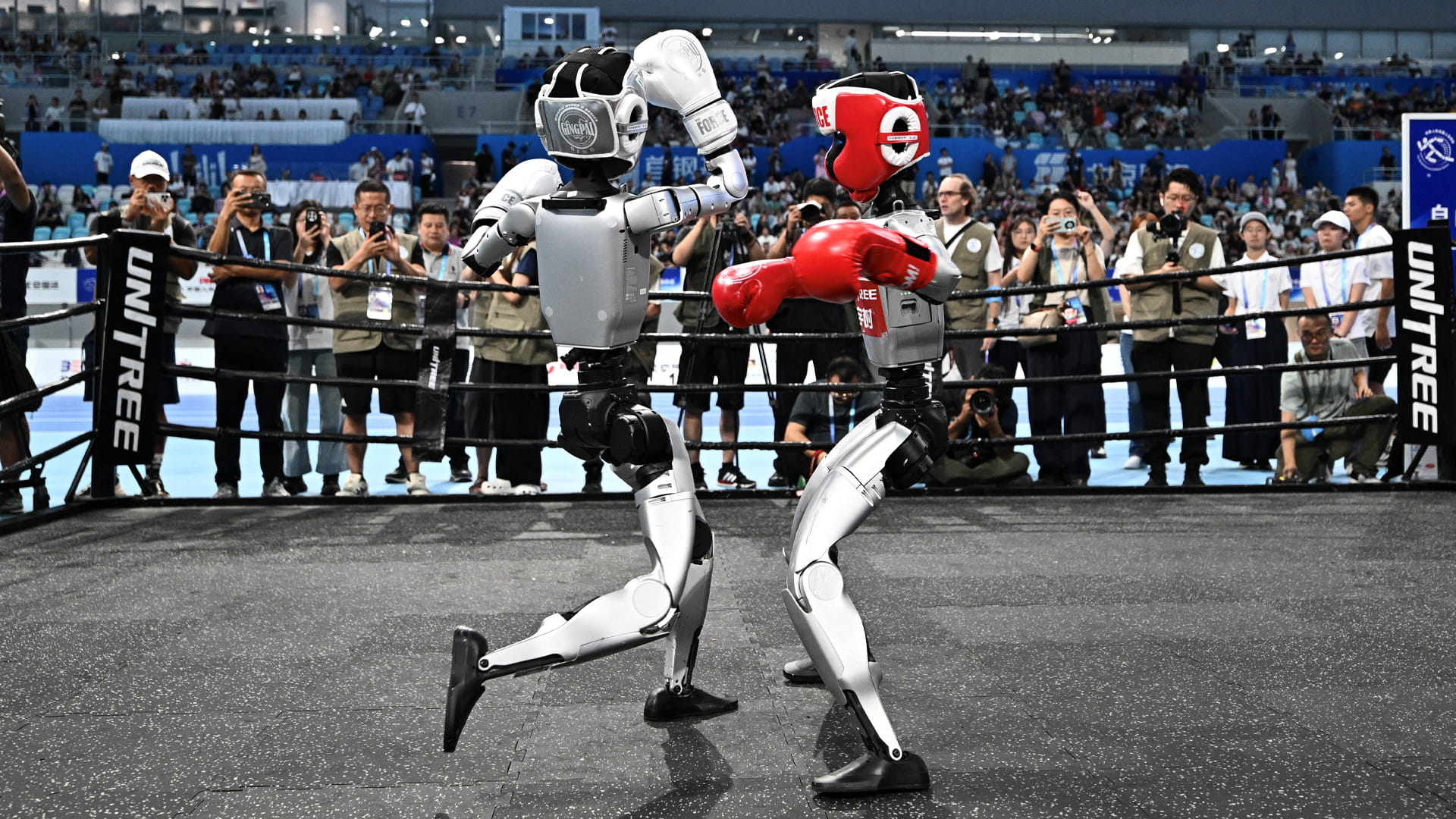 Robots race, play football, and crash at China's 'robot Olympics' 
