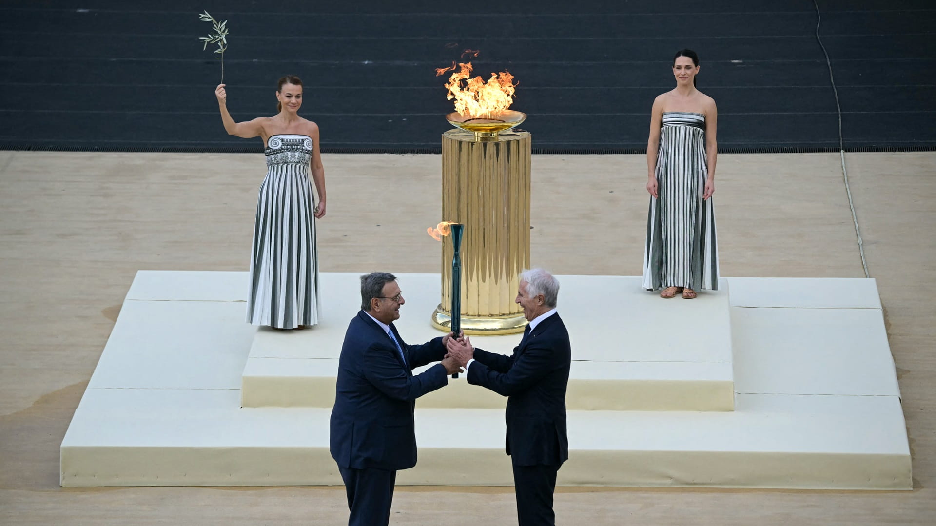 2026 Winter Olympics flame handed to Milan-Cortina organisers