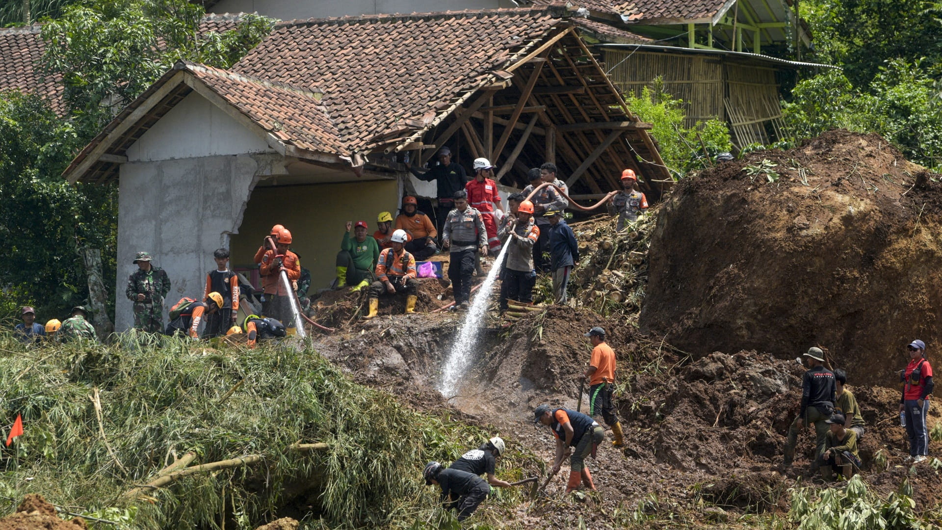 Hardships mount in Indonesia and Sri Lanka as flood tolls rise
