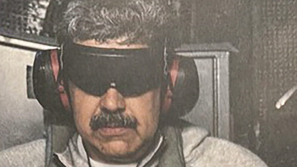 Trump shares photo of handcuffed, blindfolded Maduro 