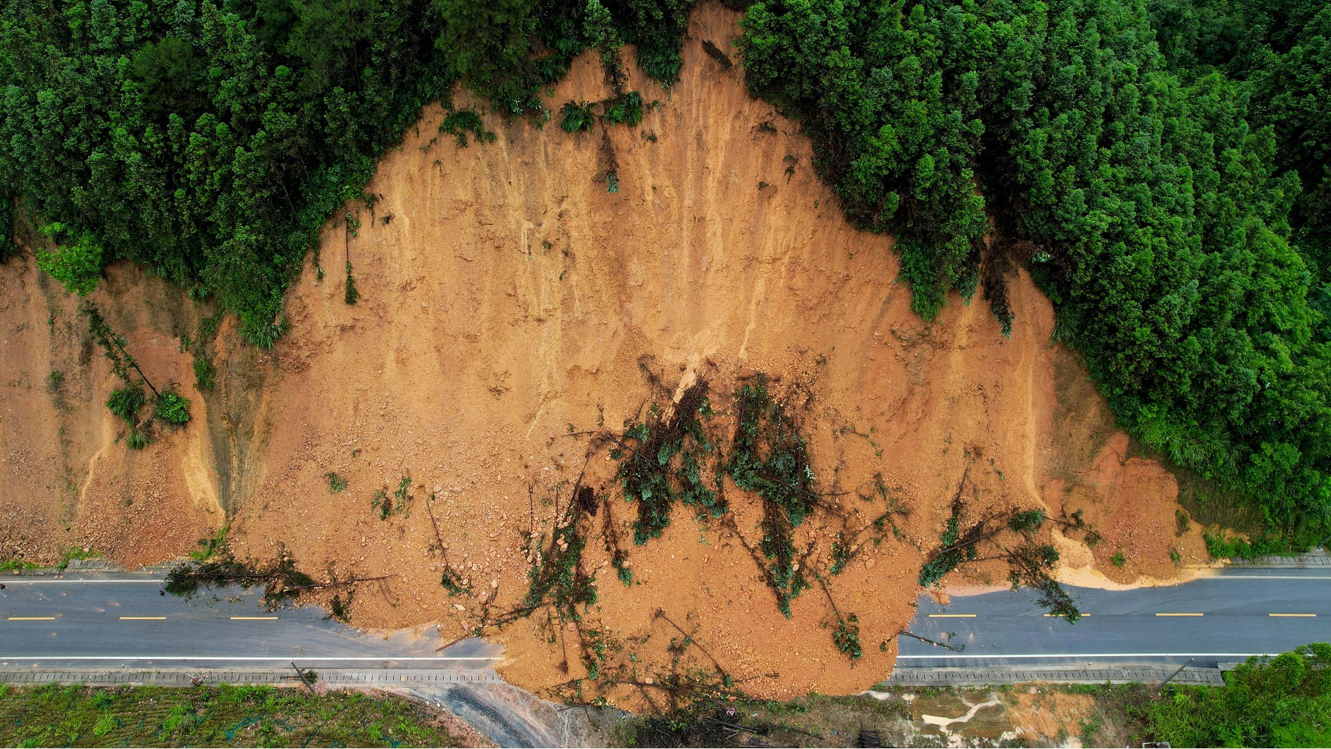 More than 30 missing after landslide hits Southwest China 