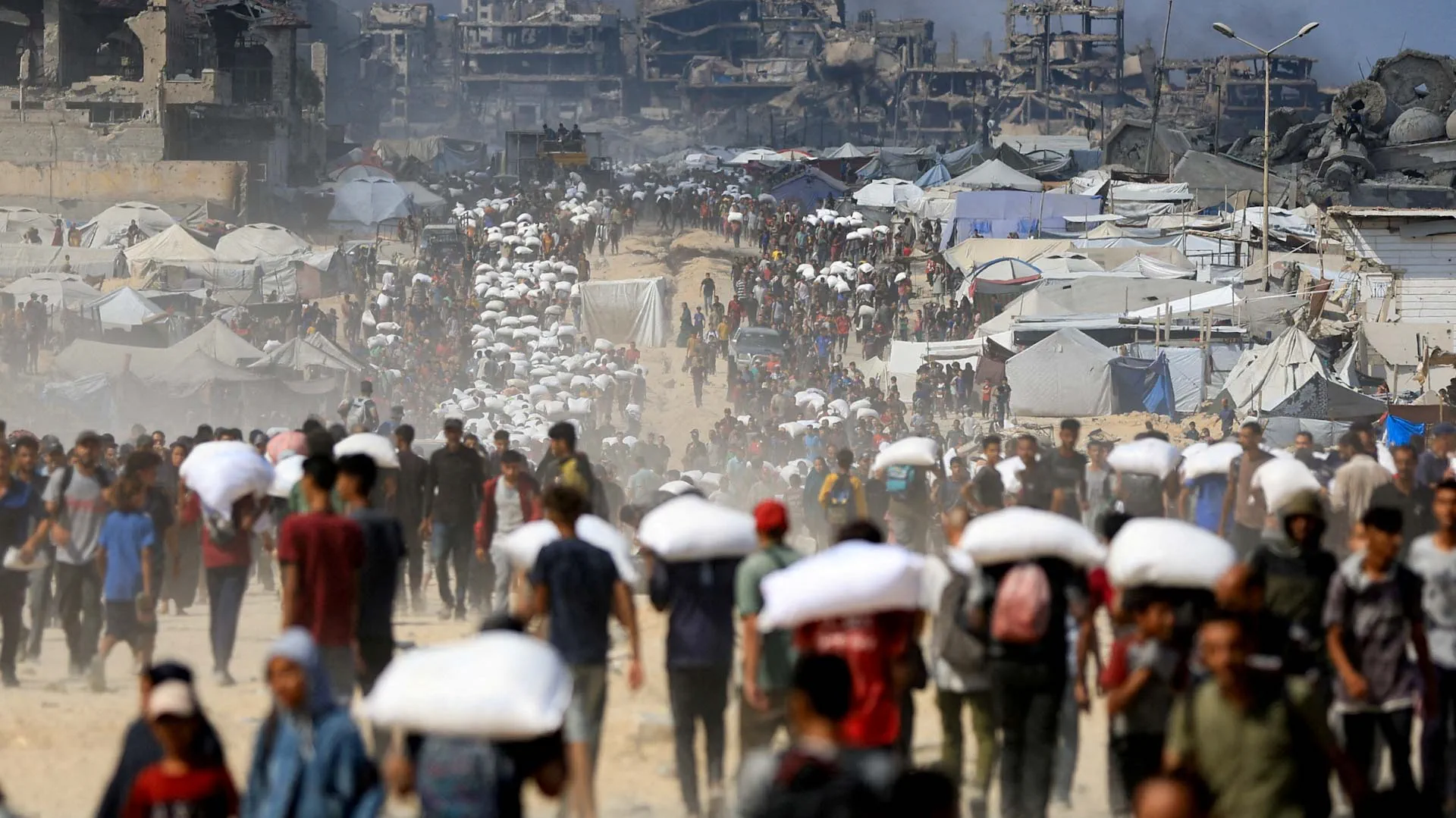 Aid trucks begin moving from Rafah Crossing toward Gaza 