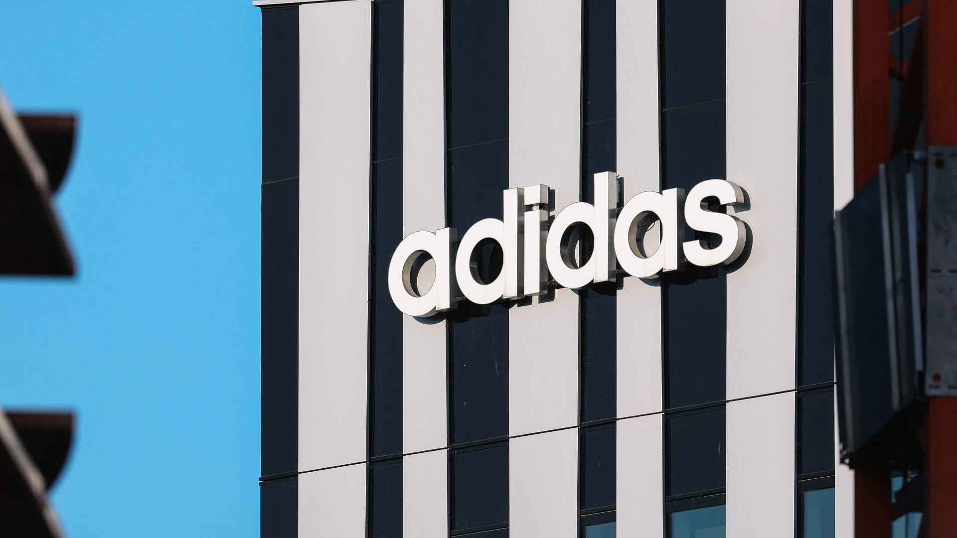 Adidas reports hit from US tariffs