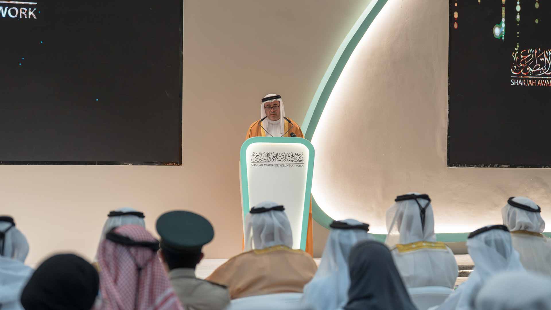 صورة بعنوان: <span class="scChromeData">{"commands":[{"click":"chrome:common:edititem({command:\"webedit:open\"})","header":"Edit the related item","icon":"/temp/iconcache/office/16x16/cubes.png","disabledIcon":"/temp/cubes_disabled16x16.png","isDivider":false,"tooltip":"Edit the related item in the Content Editor.","type":"common"},{"click":"chrome:rendering:personalize({command:\"webedit:personalize\"})","header":"Personalize","icon":"/temp/iconcache/office/16x16/users_family.png","disabledIcon":"/temp/users_family_disabled16x16.png","isDivider":false,"tooltip":"Create or edit personalization for this component.","type":"sticky"},{"click":"chrome:rendering:editvariations({command:\"webedit:editvariations\"})","header":"Edit variations","icon":"/temp/iconcache/office/16x16/windows.png","disabledIcon":"/temp/windows_disabled16x16.png","isDivider":false,"tooltip":"Edit the variations.","type":"sticky"}],"contextItemUri":"sitecore://master/{F879C514-6C8C-450D-97A7-C5424EC03F9B}?lang=ar&ver=1","custom":{},"displayName":"Title","expandedDisplayName":"This is require field and Maximum 90 character is allow"}</span><span sc_parameters="prevent-line-break=true" class="scWebEditInput scEnabledChrome" id="fld_F879C5146C8C450D97A7C5424EC03F9B_E873DAB3C3324E8EB106973D9F53F5B7_ar_1_6b4d2a4f794445c7b9fa67b0308b537d_1622_edit" contenteditable="true" scdefaulttext="[No text in field]" scfieldtype="single-line text" sc-part-of="field">ولي عهد الشارقة يكرم الفائزين بجائزة الشارقة للعمل التطوعي </span>_893699A3C1194603885CCCB1BBB3CBA4