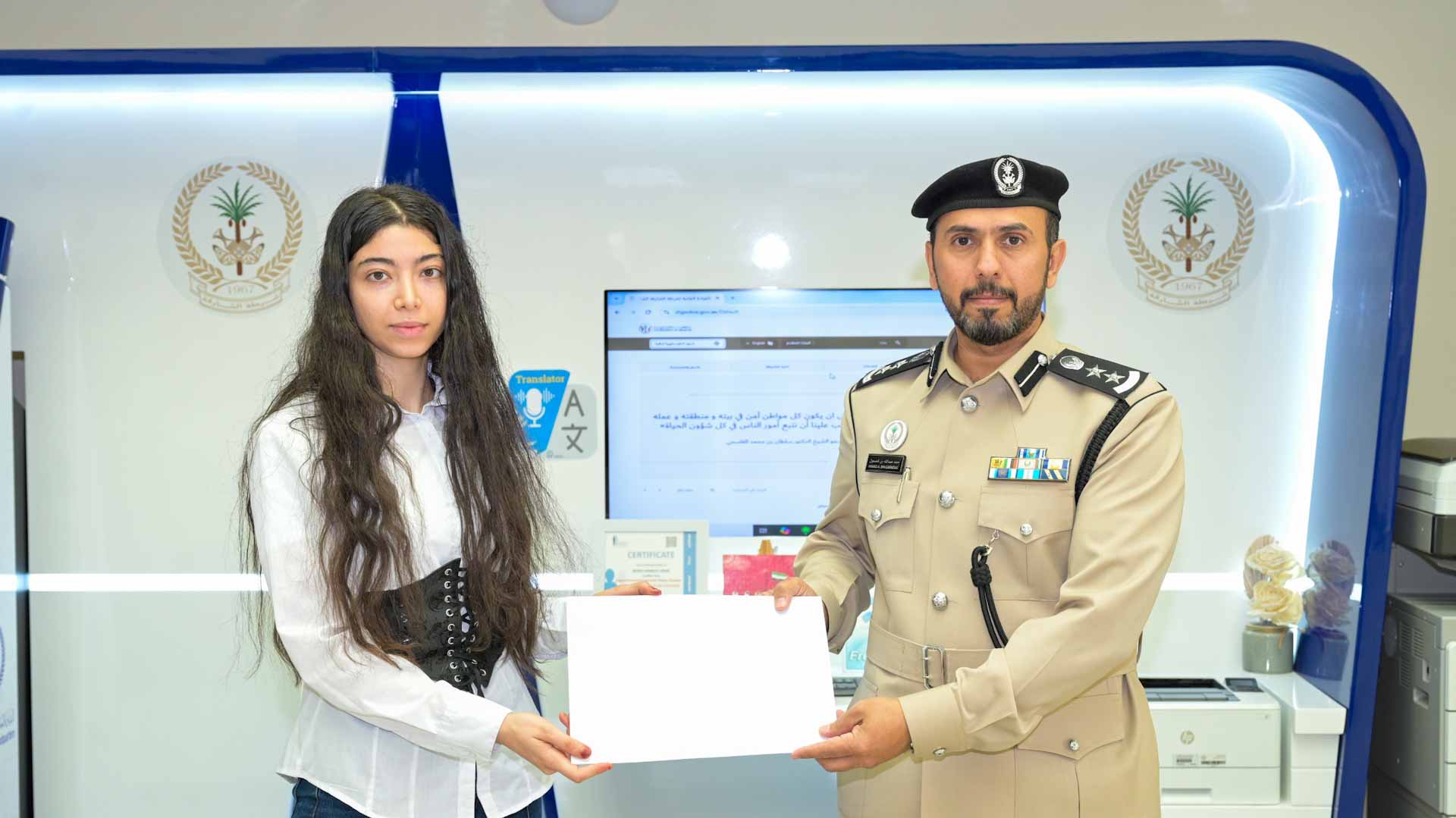 Image for the title: Sharjah Police honours community member for returning lost money 