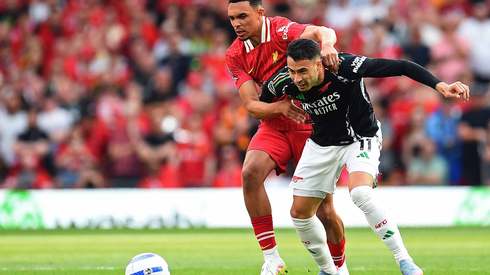 Arsenal fight back to earn draw at Anfield 