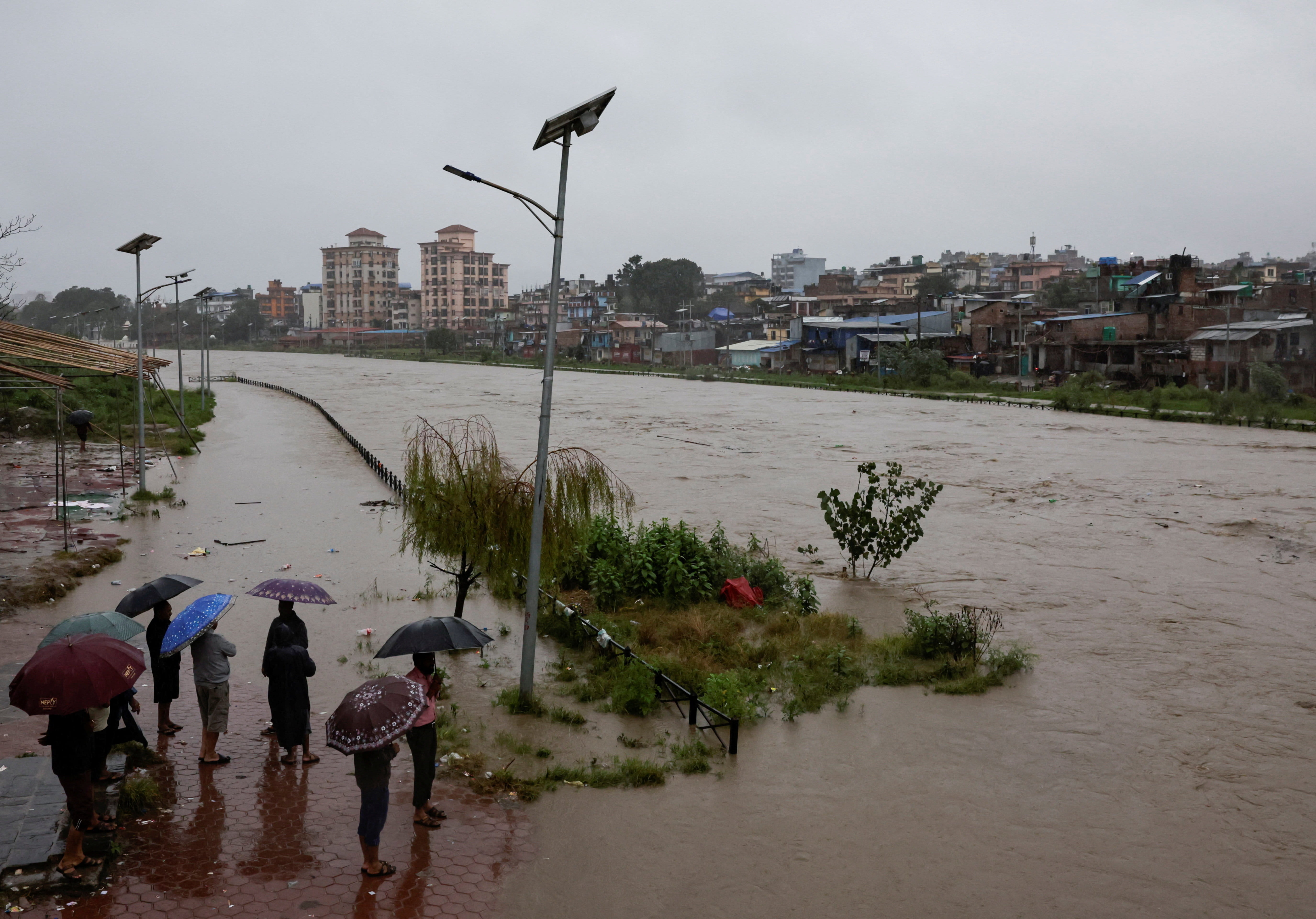 Landslides and floods kill 64 in Nepal, India