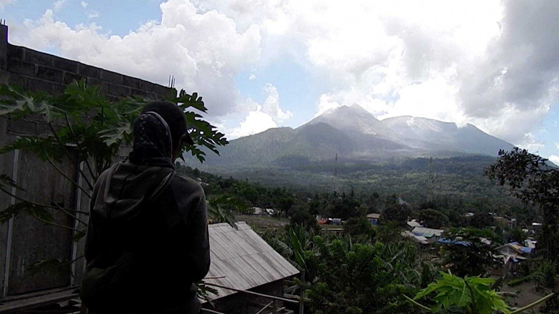 Indonesia volcano erupts, belching ash into night sky