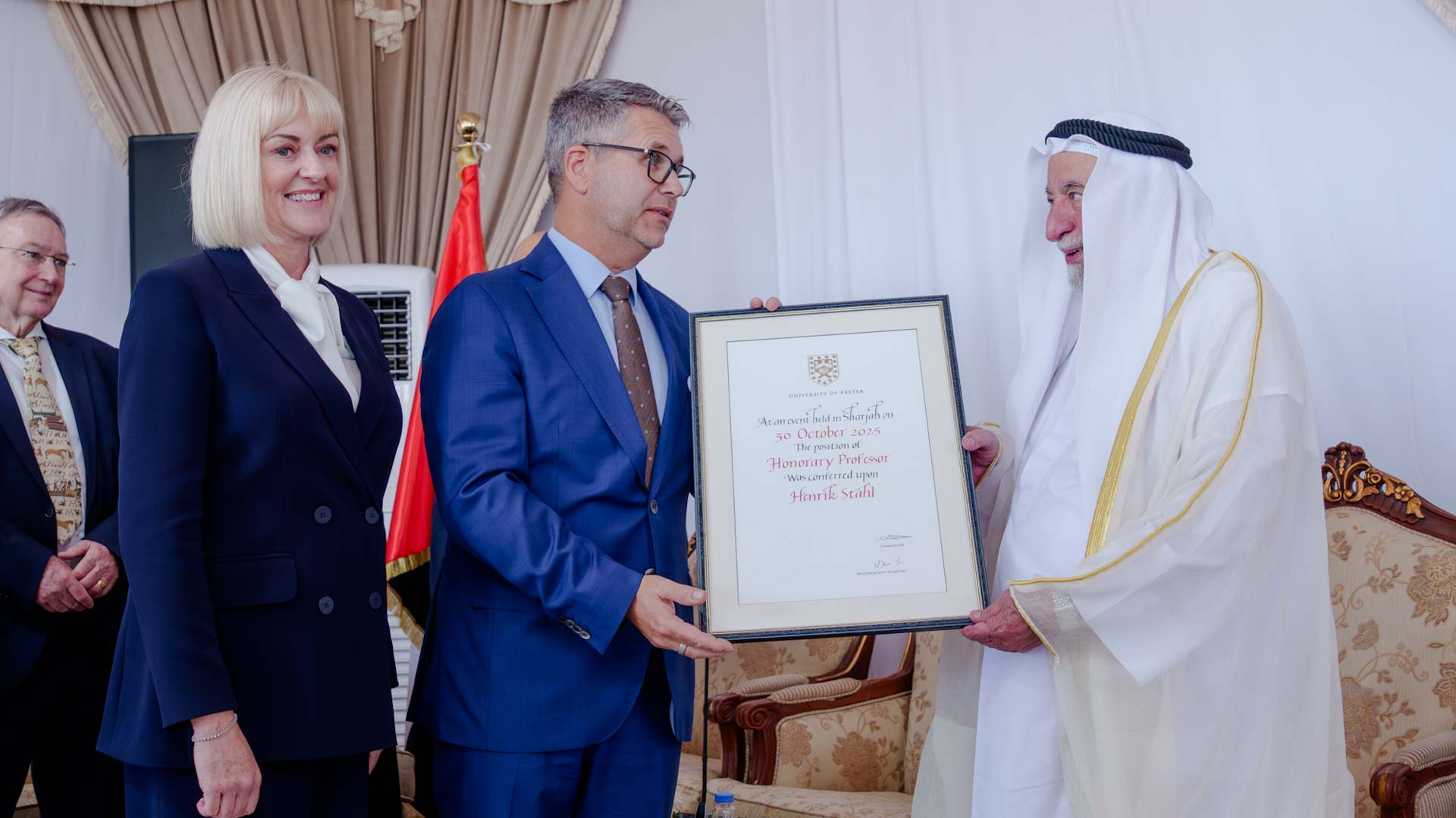 Sharjah Ruler presenting honorary to many members