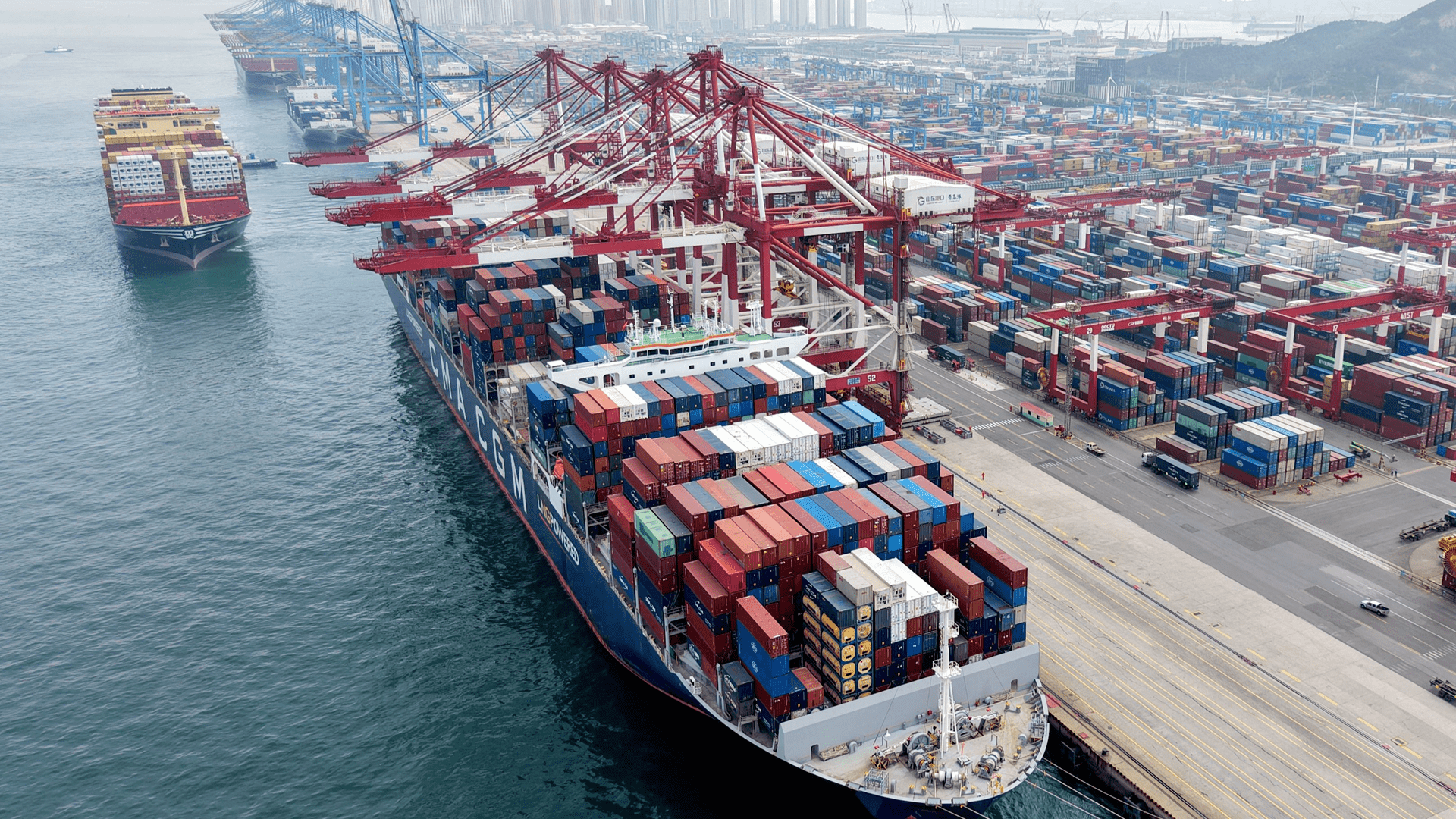 China’s exports slow in March as imports surge