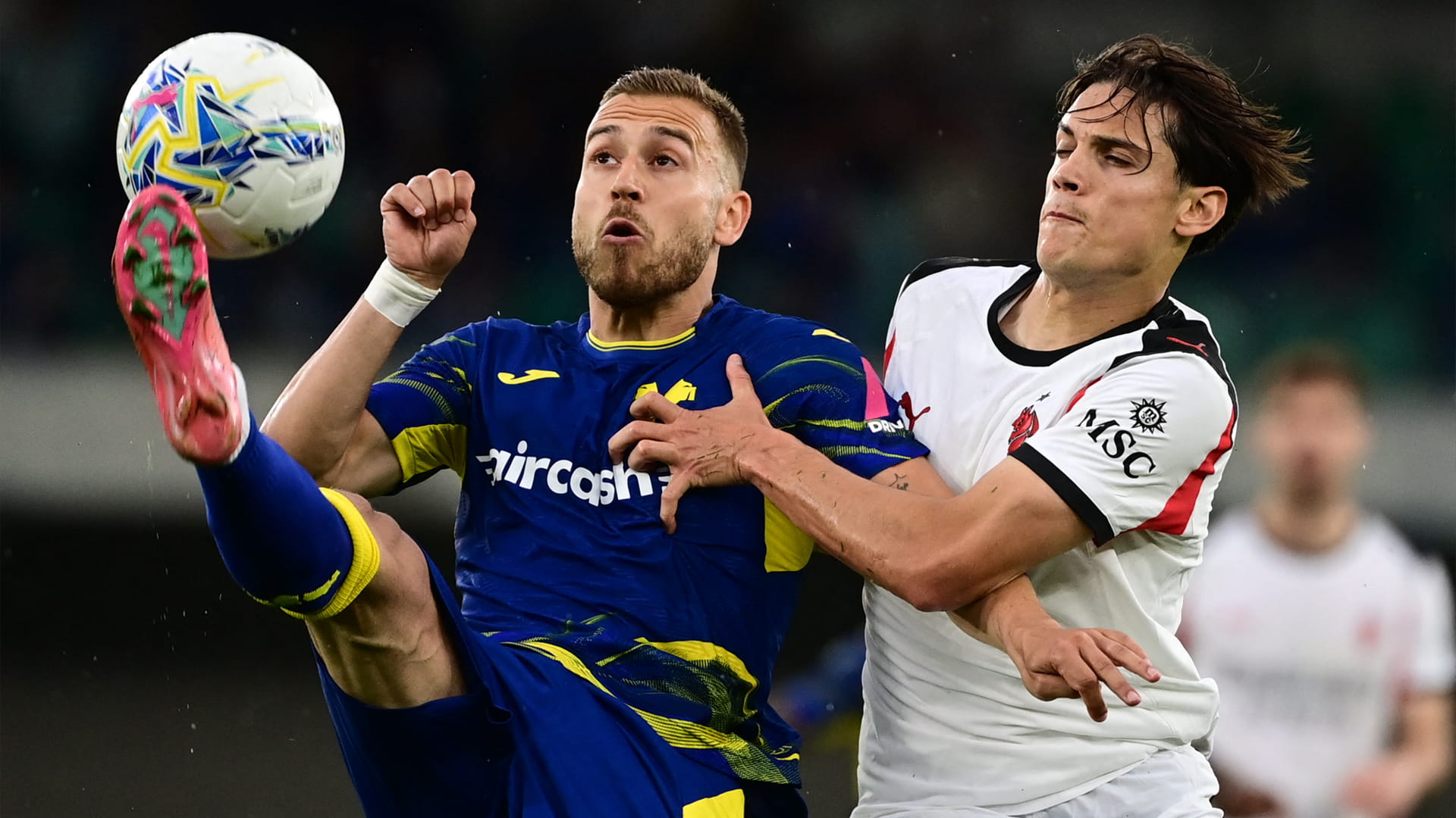 Milan boost Champions League charge with win at Verona 