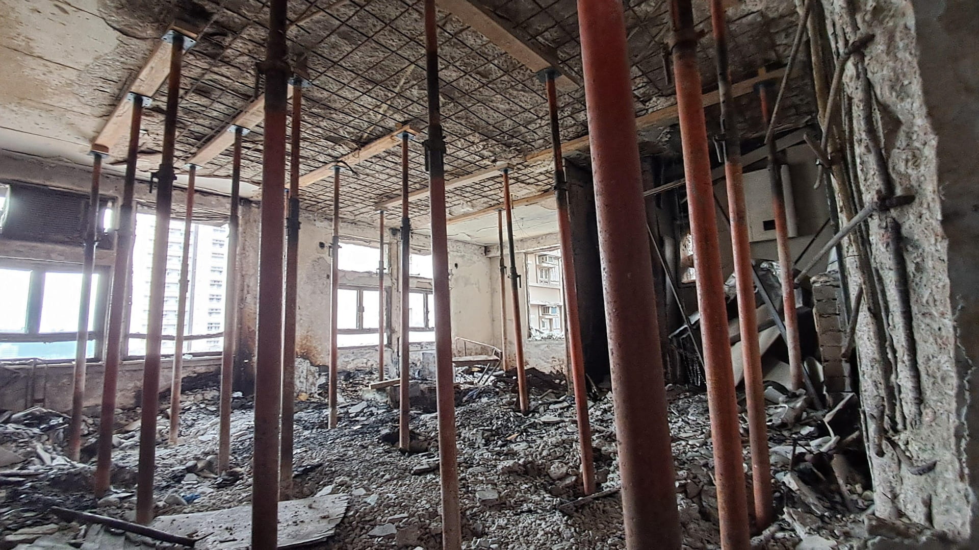 Residents return to fire-ravaged housing estate in Hong Kong SAR 