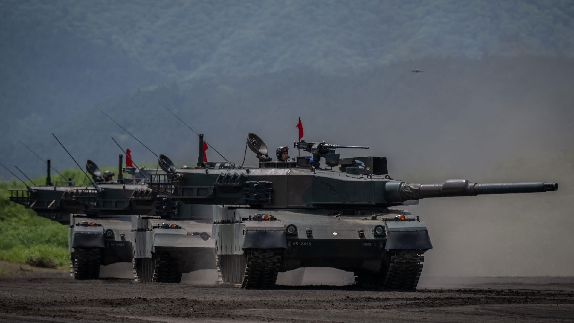 Japan eases long-standing weapons export restrictions