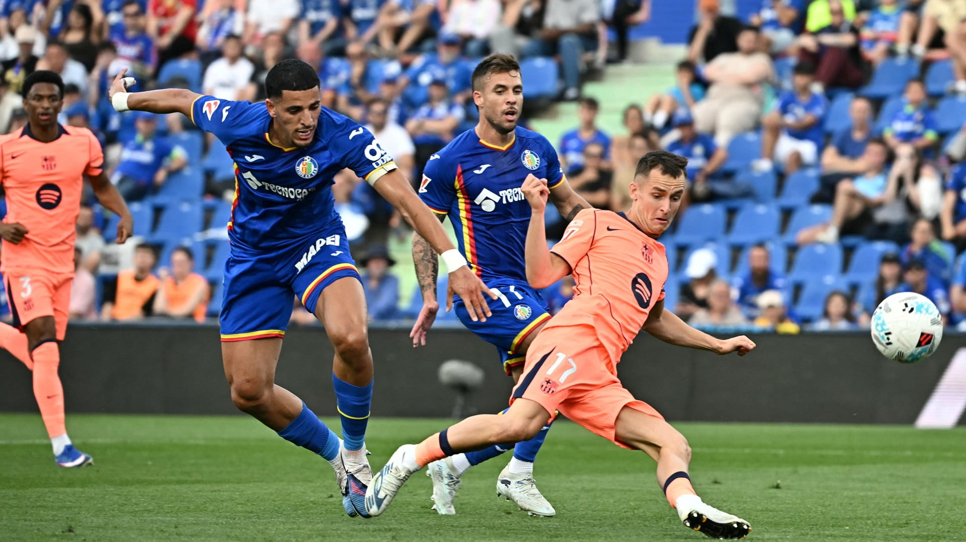Barca beat Getafe 2-0, edge closer to La Liga title 