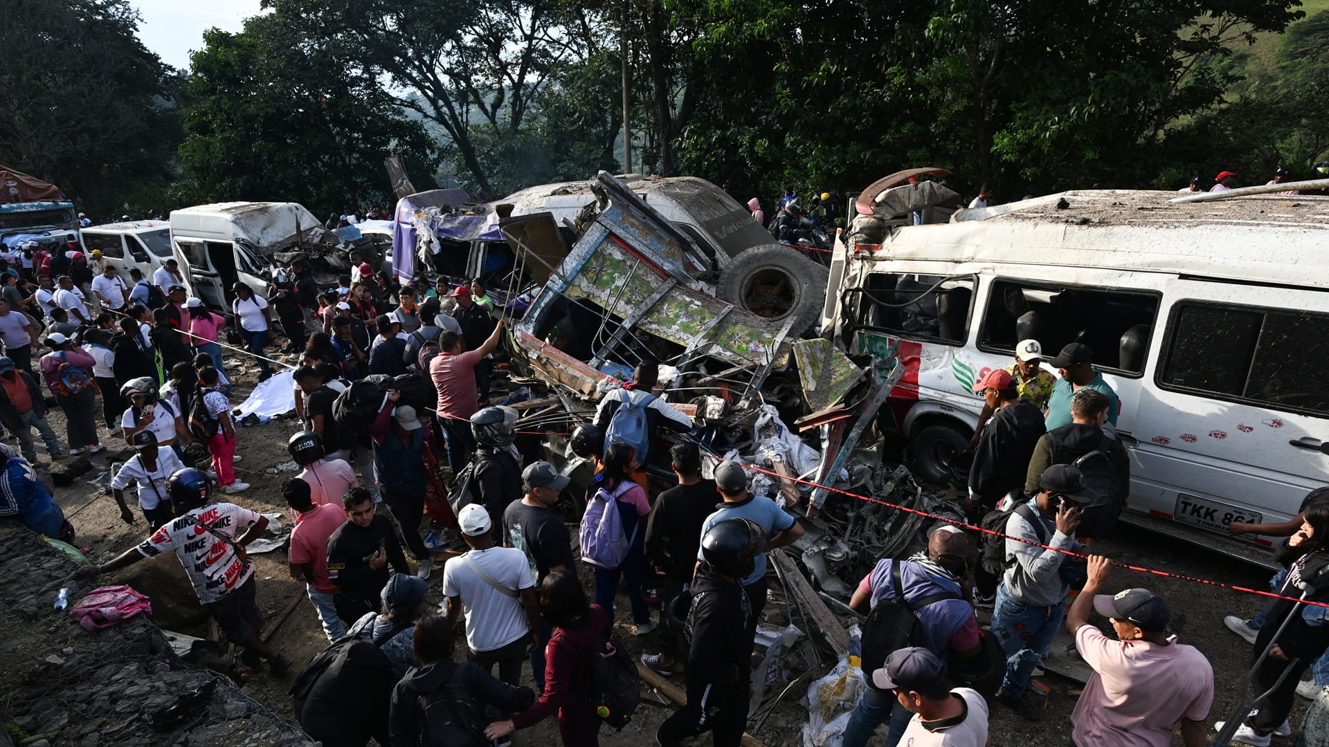 Image for the title: Blast on Colombian highway kills 13 and injures dozens 
