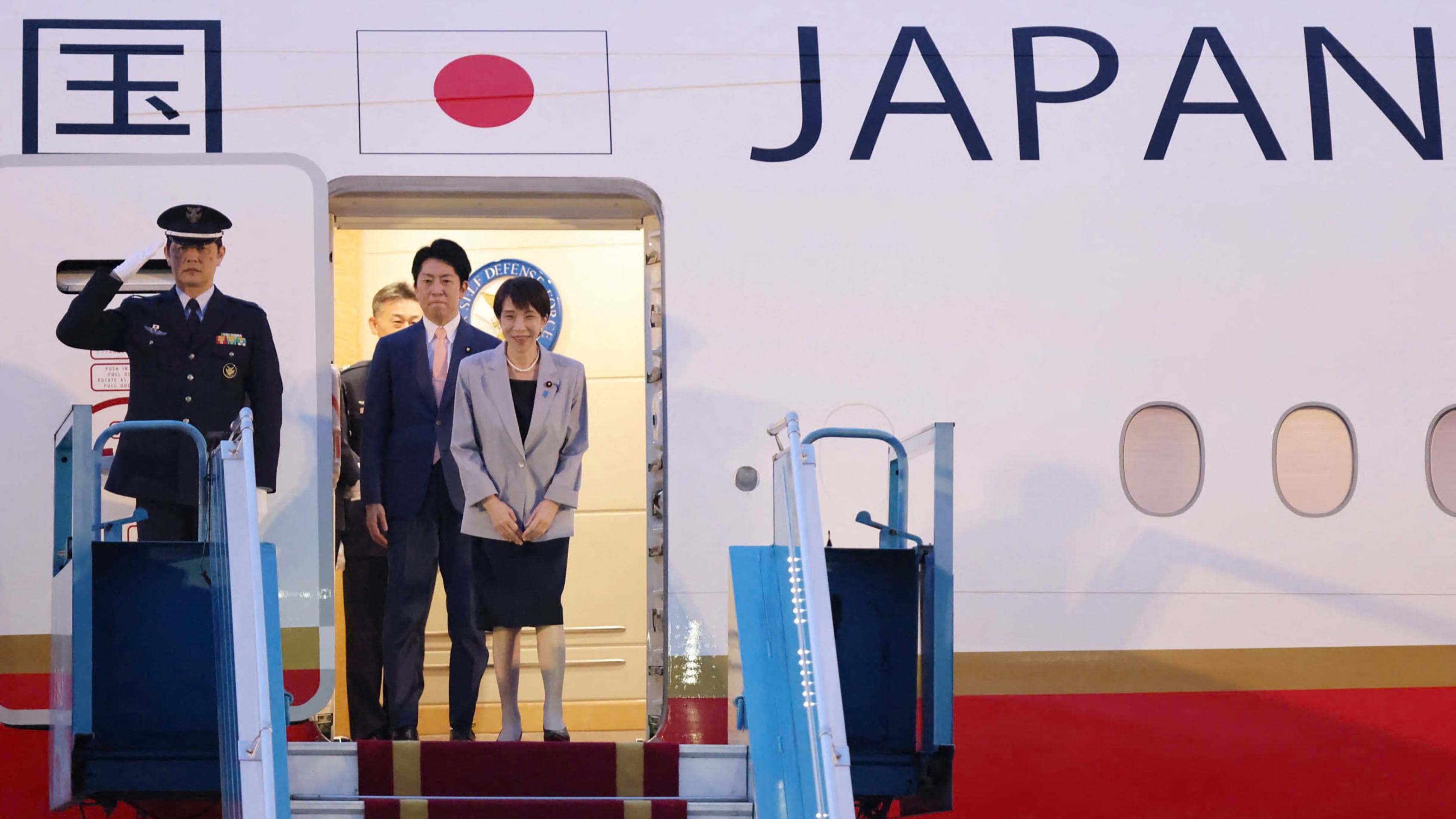 Image for the title: Japan PM vows more effort to keep Asia 'free and open' 