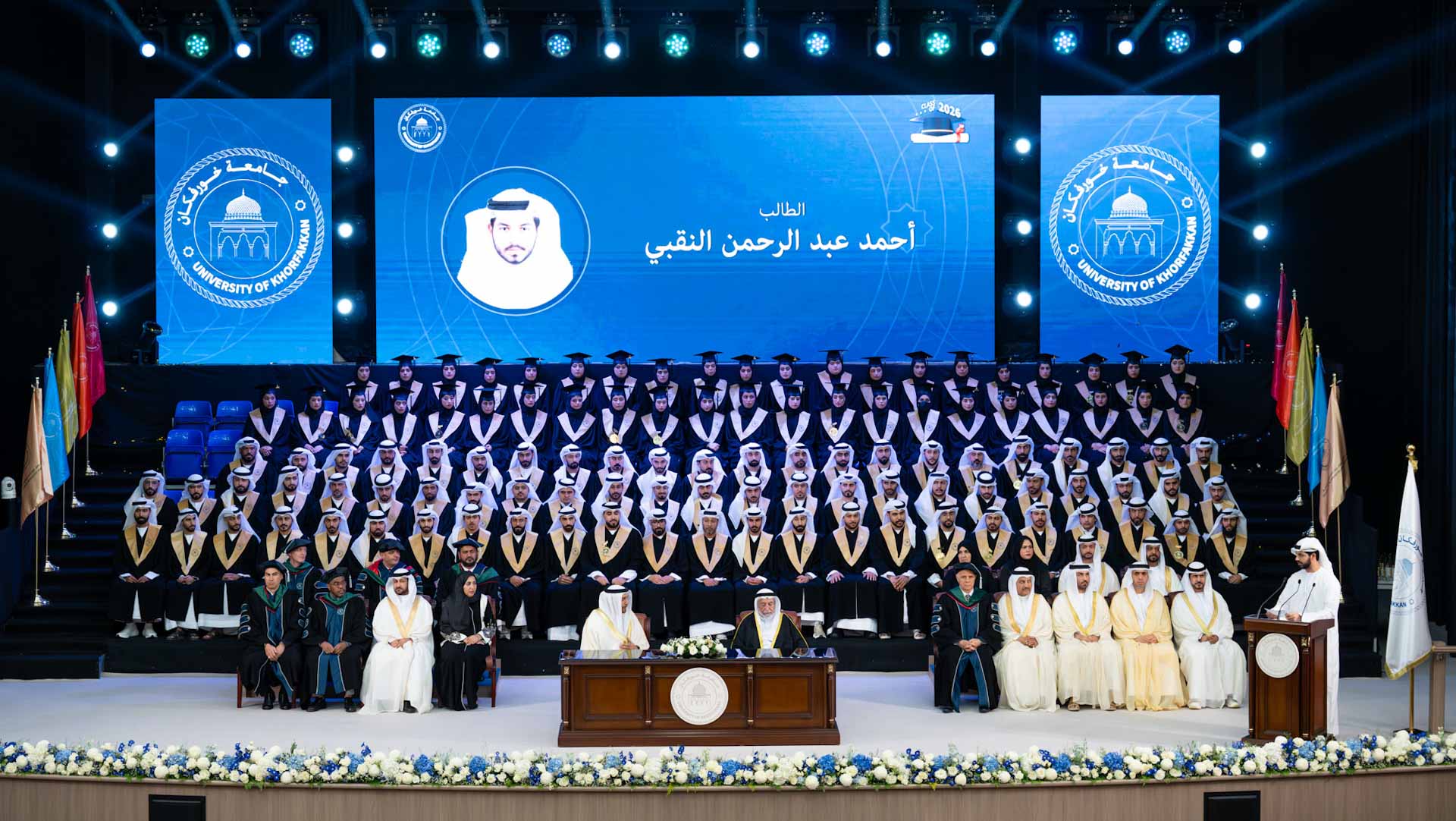 صورة بعنوان: <span class="scChromeData">{"commands":[{"click":"chrome:common:edititem({command:\"webedit:open\"})","header":"Edit the related item","icon":"/temp/iconcache/office/16x16/cubes.png","disabledIcon":"/temp/cubes_disabled16x16.png","isDivider":false,"tooltip":"Edit the related item in the Content Editor.","type":"common"},{"click":"chrome:rendering:personalize({command:\"webedit:personalize\"})","header":"Personalize","icon":"/temp/iconcache/office/16x16/users_family.png","disabledIcon":"/temp/users_family_disabled16x16.png","isDivider":false,"tooltip":"Create or edit personalization for this component.","type":"sticky"},{"click":"chrome:rendering:editvariations({command:\"webedit:editvariations\"})","header":"Edit variations","icon":"/temp/iconcache/office/16x16/windows.png","disabledIcon":"/temp/windows_disabled16x16.png","isDivider":false,"tooltip":"Edit the variations.","type":"sticky"}],"contextItemUri":"sitecore://master/{2CE2FCAD-3282-4EE6-94C9-8A42F7F51296}?lang=ar&ver=1","custom":{},"displayName":"Title","expandedDisplayName":"This is require field and Maximum 90 character is allow"}</span><span sc_parameters="prevent-line-break=true" class="scWebEditInput scEnabledChrome" id="fld_2CE2FCAD32824EE694C98A42F7F51296_E873DAB3C3324E8EB106973D9F53F5B7_ar_1_4d02f8fcde3849199bb5bc7346e8462a_1729_edit" contenteditable="true" scdefaulttext="[No text in field]" scfieldtype="single-line text" sc-part-of="field">حاكم الشارقة يشهد حفل تخريج الدفعة الأولى من طلبة جامعة خورفكان</span>_B23B1FA1F0B34263A26C0A7387708F1E