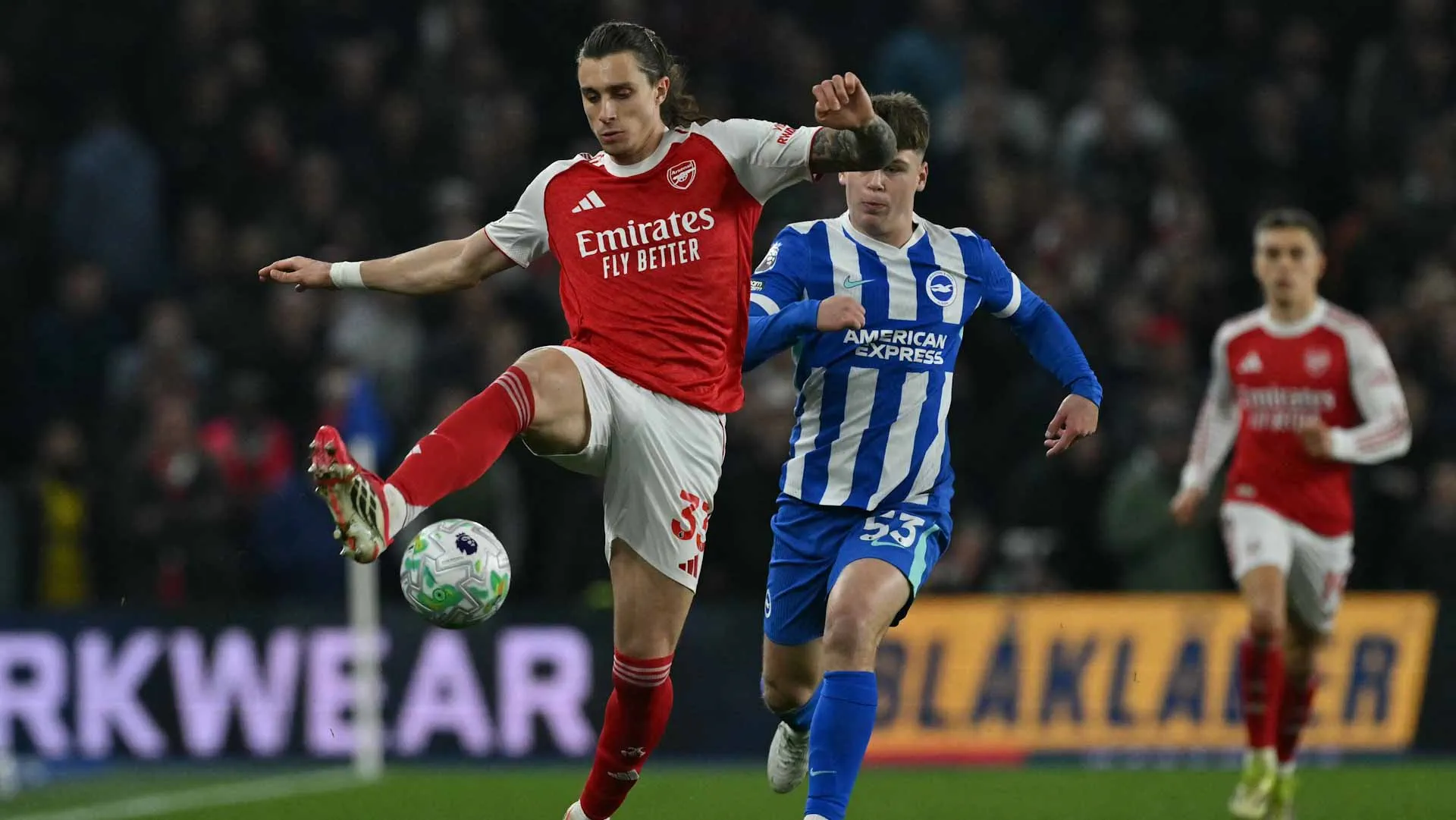 Arsenal extend lead as Man City draw with Nottingham