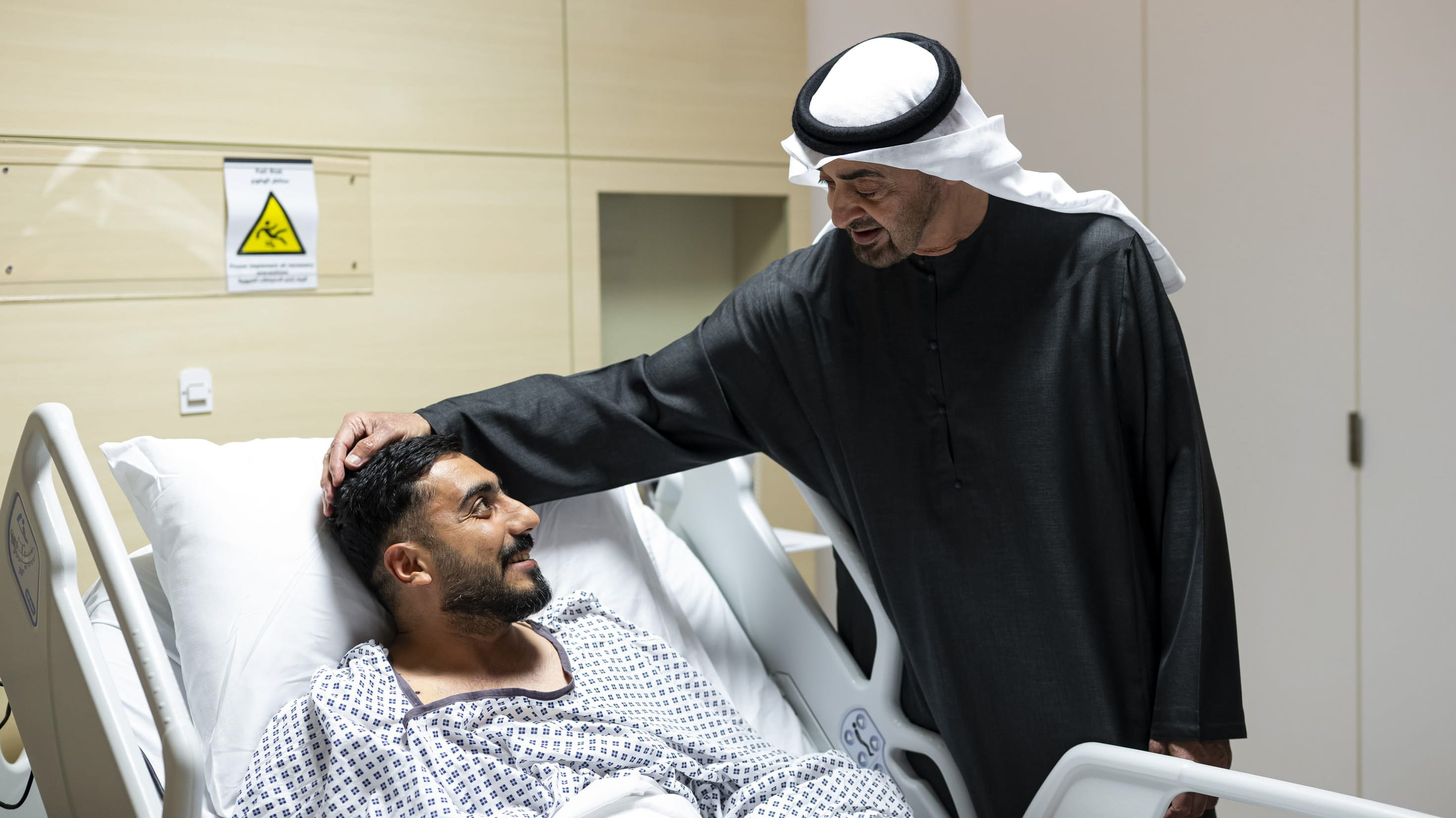 UAE President visits injured patients in hospital 
