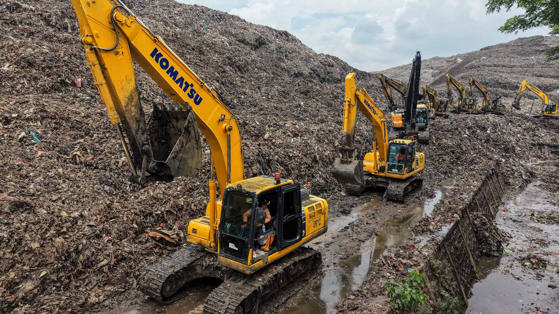 Indonesia waste site landslide kills four, several missing 