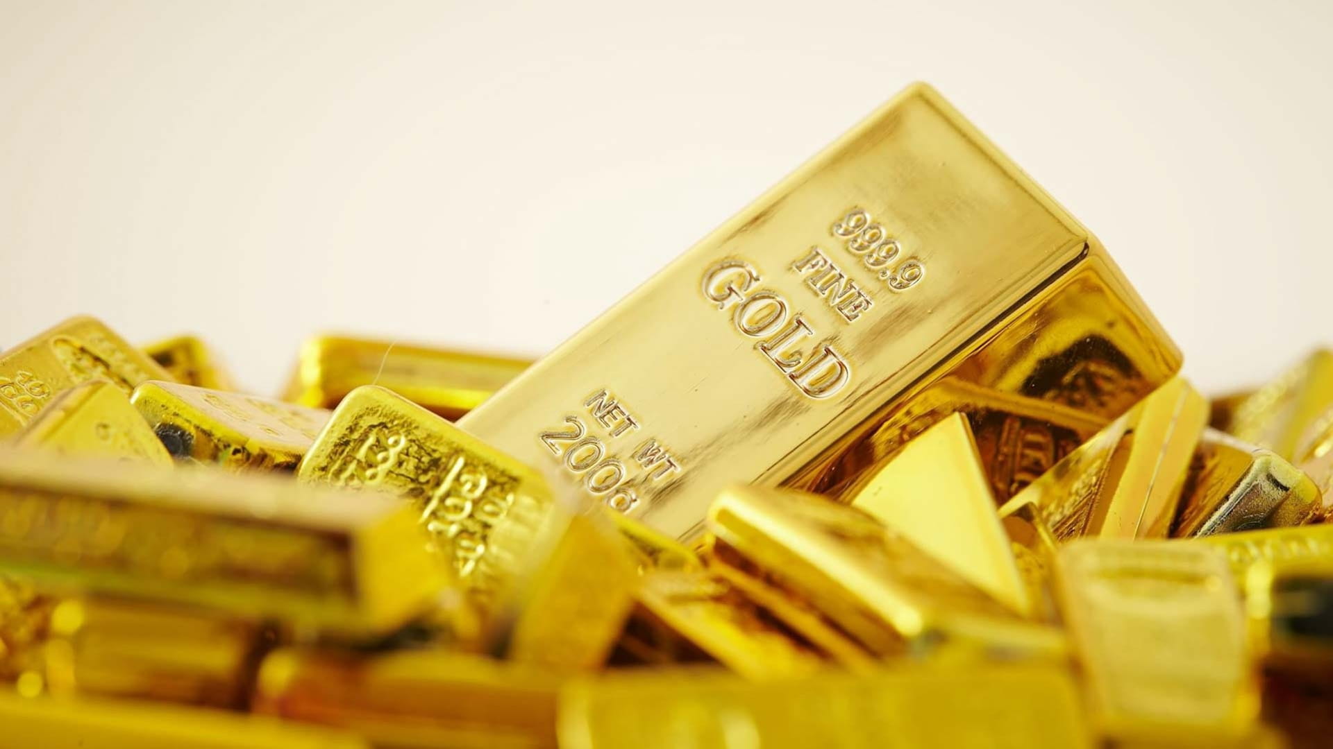 Gold rises in volatile trade ahead of US inflation data
