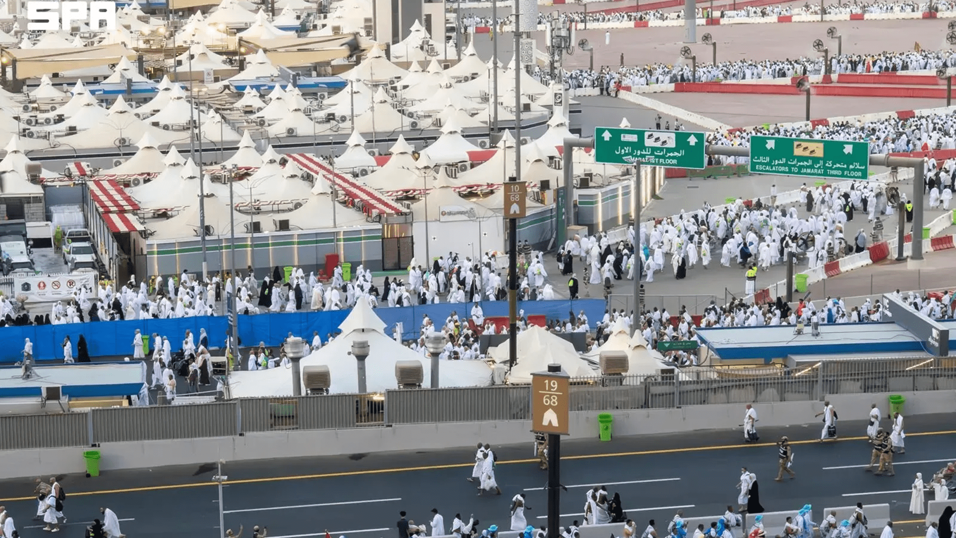 Pilgrims stone Jamarat Al Aqabah on Day of Sacrifice 